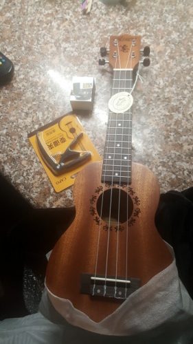 Explore the Melodic World with Our 23 Inch Ukulele  for Sale photo review