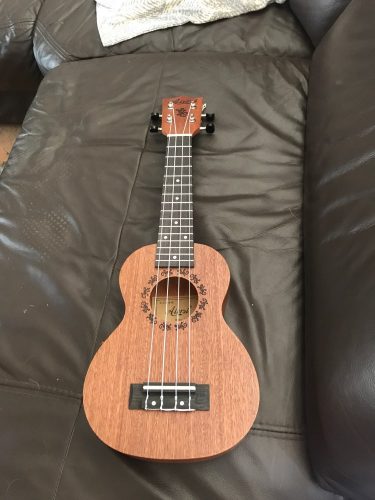 Explore the Melodic World with Our 23 Inch Ukulele  for Sale photo review